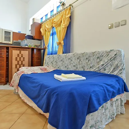 Dino 1374 Apartman Póla